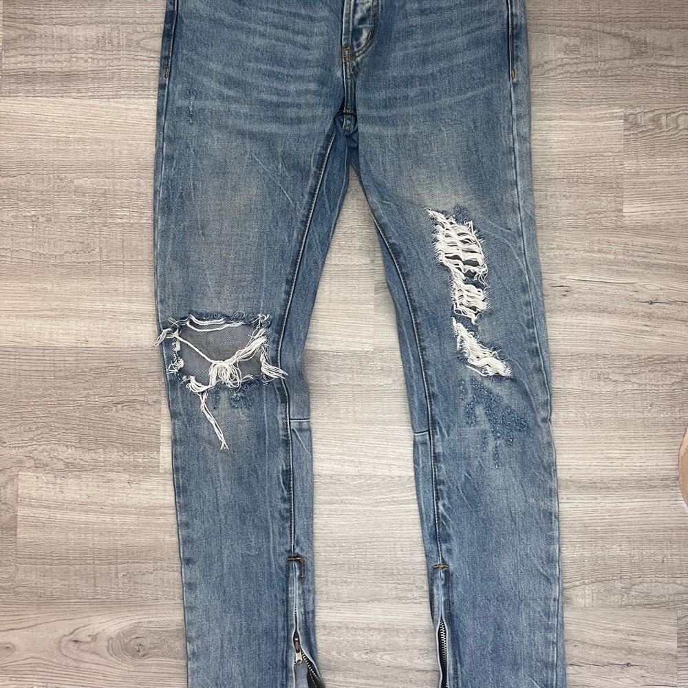 Blue Skinny Jeans with Distressed Details